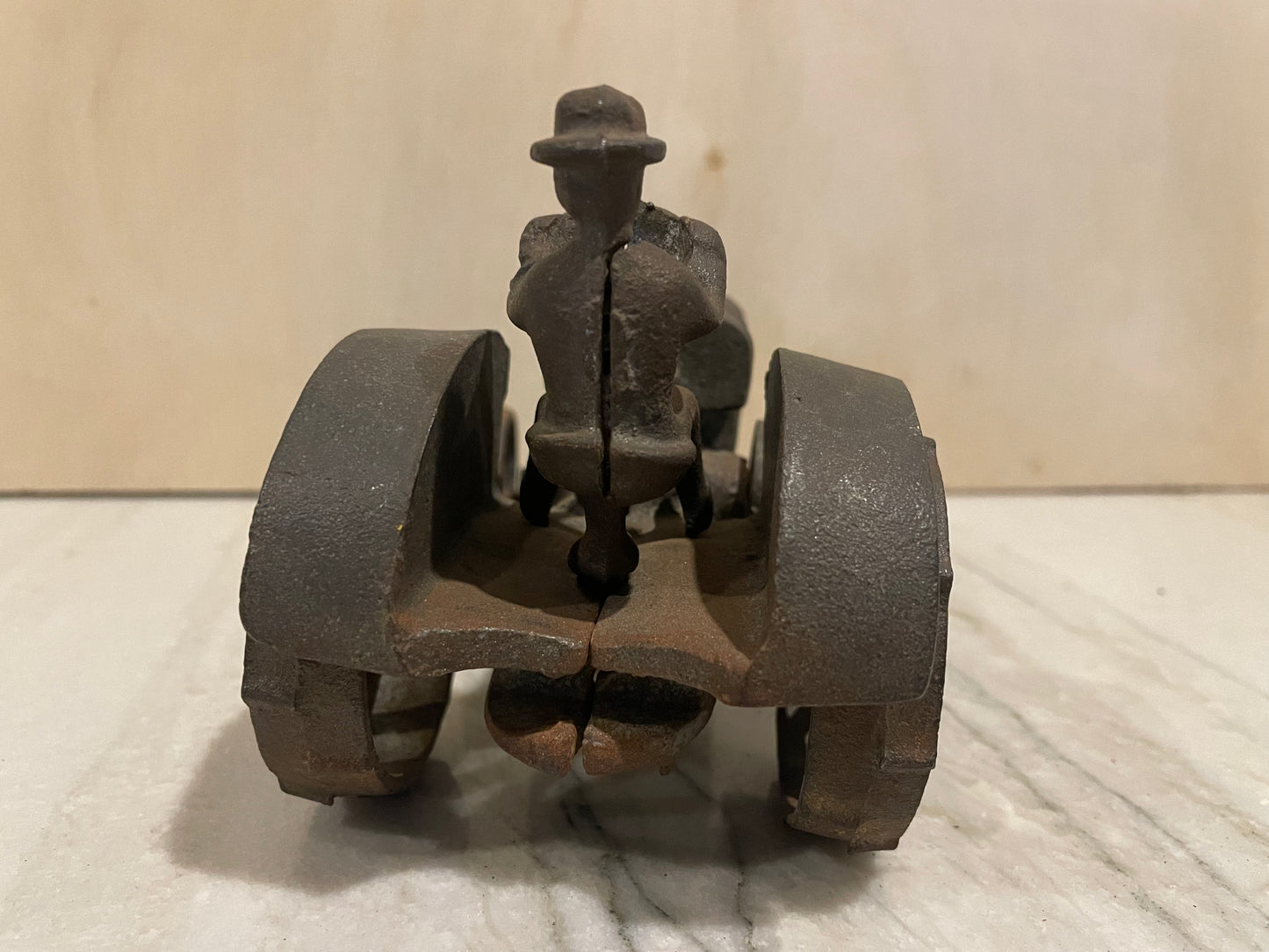 VINTAGE MCCORMICK DEERING TRACTOR W/ MAN CAST IRON