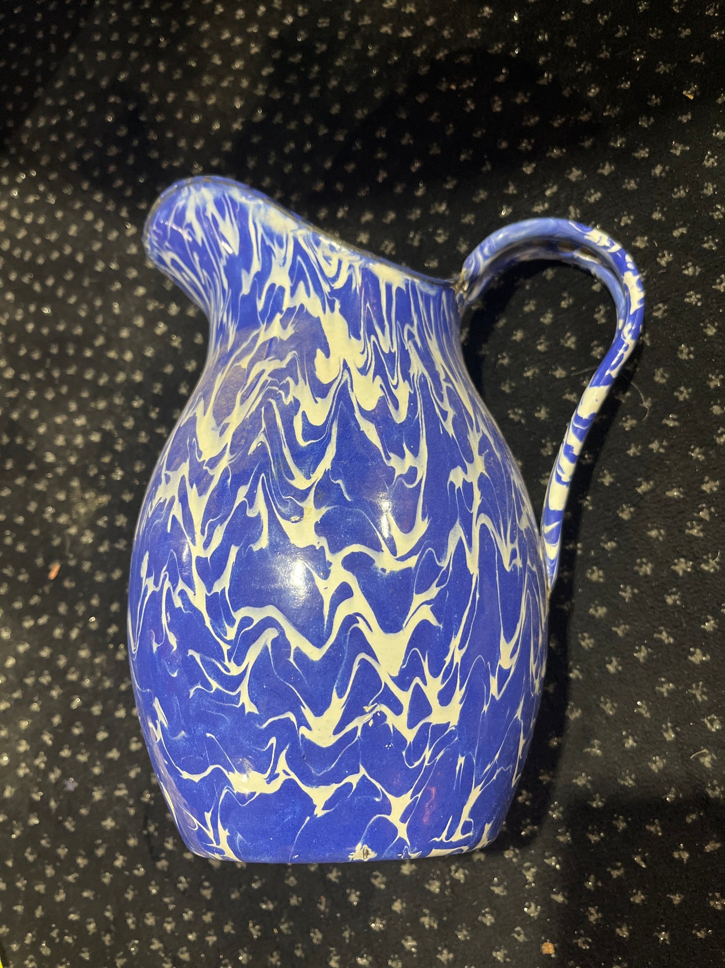 Blue enamelware pitcher